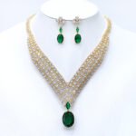 Wholesale platinum plated necklace set with cubic zirconia stones. Elegant brass V-shaped necklace and matching drop earrings for formal wear.