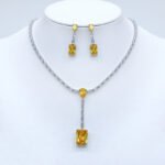 Wholesale baguette Y-drop necklace and earring set with platinum plating from JuneJewelry.com – modern copper fashion jewelry for bulk orders.