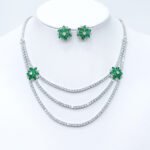 Wholesale bridal zircon jewelry set with multi-layered necklace and floral stud earrings. Platinum-plated copper set for weddings and formal wear from Junejewelry.com.