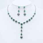 Wholesale bridal zircon necklace set with cushion-cut and heart-shaped stones. Platinum-plated copper bib necklace and drop earrings for weddings and formal wear from Junejewelry.com.