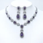 Wholesale teardrop halo necklace and earring set with platinum plating from JuneJewelry.com – dramatic copper fashion jewelry for bulk orders.