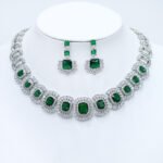 Wholesale cushion-cut halo collar necklace and earring set with platinum plating from JuneJewelry.com – opulent copper fashion jewelry for bulk orders.