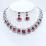 Wholesale cushion-cut halo collar necklace and earring set with platinum plating from JuneJewelry.com – opulent copper fashion jewelry for bulk orders.