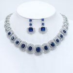 Wholesale cushion-cut halo collar necklace and earring set with platinum plating from JuneJewelry.com – opulent copper fashion jewelry for bulk orders.
