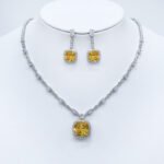 Wholesale cushion-cut halo necklace and earring set with platinum plating from JuneJewelry.com – luxurious copper fashion jewelry for bulk orders.