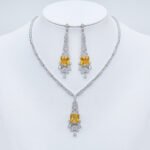 Wholesale rectangular Y-drop necklace and earring set with platinum plating from JuneJewelry.com – modern copper fashion jewelry for bulk orders.