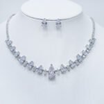 Wholesale teardrop zircon jewelry set, platinum plated on copper, featuring a necklace and matching earrings from JuneJewelry.com – high-quality, factory-direct fashion jewelry for bulk buyers.