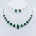 Wholesale teardrop zircon jewelry set, platinum plated on copper, featuring a necklace and matching earrings from JuneJewelry.com – high-quality, factory-direct fashion jewelry for bulk buyers.