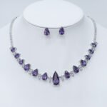 Wholesale teardrop zircon jewelry set, platinum plated on copper, featuring a necklace and matching earrings from JuneJewelry.com – high-quality, factory-direct fashion jewelry for bulk buyers.