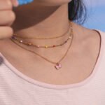 Wholesale butterfly jewelry set – pink enamel kids necklace, bracelet, earrings, and ring in 18K gold plated stainless steel from JuneJewelry.com.