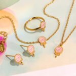 Wholesale kids lollipop jewelry set – glitter enamel necklace, bracelet, ring, and earrings in 18K gold plated stainless steel.
