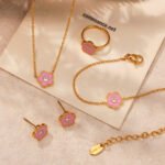 Wholesale kids flower jewelry set – stainless steel with cubic zirconia, 18K gold plated, necklace, bracelet, earrings, and ring.