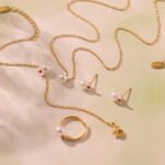 Wholesale kids pearl jewelry set – princess bow knot necklace, bracelet, earrings, and ring in 18K gold plated stainless steel.