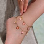 Wholesale kids charm jewelry set with sun, star, and cloud enamel in 18K gold plated stainless steel – necklace, bracelet, and anklet.