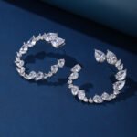 Wholesale Colorful Flower Stud Earrings with a gold plated finish and red and clear cubic zirconia stones from JuneJewelry.com – unique fashion jewelry for bulk orders.