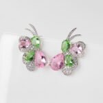 Wholesale butterfly stud earrings with pink and green multi-color zirconia and 925 silver needles from JuneJewelry.com.
