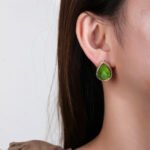 Wholesale gold plated teardrop earrings with green chalcedony stones and 925 silver needles from JuneJewelry.com.