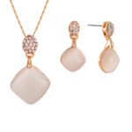 Wholesale rose gold cat eye set with square pendant necklace and drop earrings, accented with clear zircon stones, from JuneJewelry.com.
