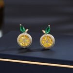 Wholesale lemon jewelry set with necklace and earrings in 18K gold plating – cute, fresh fashion accessories from JuneJewelry.com.