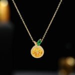 Wholesale lemon jewelry set with necklace and earrings in 18K gold plating – cute, fresh fashion accessories from JuneJewelry.com.