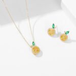 Wholesale lemon jewelry set with necklace and earrings in 18K gold plating – cute, fresh fashion accessories from JuneJewelry.com.