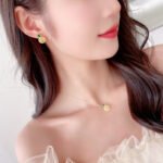Wholesale lemon jewelry set with necklace and earrings in 18K gold plating – cute, fresh fashion accessories from JuneJewelry.com.