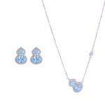Blue zircon jewelry set wholesale – platinum plated copper necklace and earrings with gourd-shaped pendant and sparkling light blue stones.