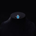 Wholesale Blue Zircon Gourd Set (Hulu shape), featuring copper plated with white gold, micro-pave vibrant blue zircon stones, gourd stud earrings, and a simple versatile neck chainand ring, a light luxury colorful set from junejewelry.com.