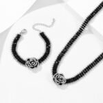 Wholesale Black Camellia Zircon Jewelry Set for women, featuring a black zircon flower choker and a vintage black camellia necklace and bracelet, made from white gold plated copper, emphasizing a high-end, light luxury aesthetic from junejewelry.com.