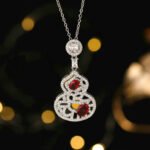 Wholesale hollow gourd zircon jewelry set with necklace and earrings in white gold plating – elegant floral hollow design from JuneJewelry.com.