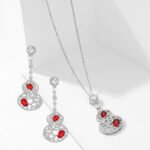 Wholesale hollow gourd zircon jewelry set with necklace and earrings in white gold plating – elegant floral hollow design from JuneJewelry.com.