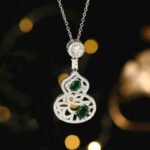Wholesale hollow gourd zircon jewelry set with necklace and earrings in white gold plating – elegant floral hollow design from JuneJewelry.com.