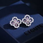 Zircon flower jewelry set wholesale – clover design necklace and earrings with shining cubic zirconia stones, gold or platinum plated.