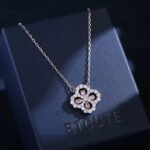 Zircon flower jewelry set wholesale – clover design necklace and earrings with shining cubic zirconia stones, gold or platinum plated.