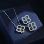 Zircon flower jewelry set wholesale – clover design necklace and earrings with shining cubic zirconia stones, gold or platinum plated.