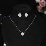 Wholesale clover zircon jewelry set with necklace and earrings in white gold plating – trendy, high-quality fashion jewelry from JuneJewelry.com.