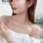 Wholesale clover zircon jewelry set with necklace and earrings in white gold plating – trendy, high-quality fashion jewelry from JuneJewelry.com.