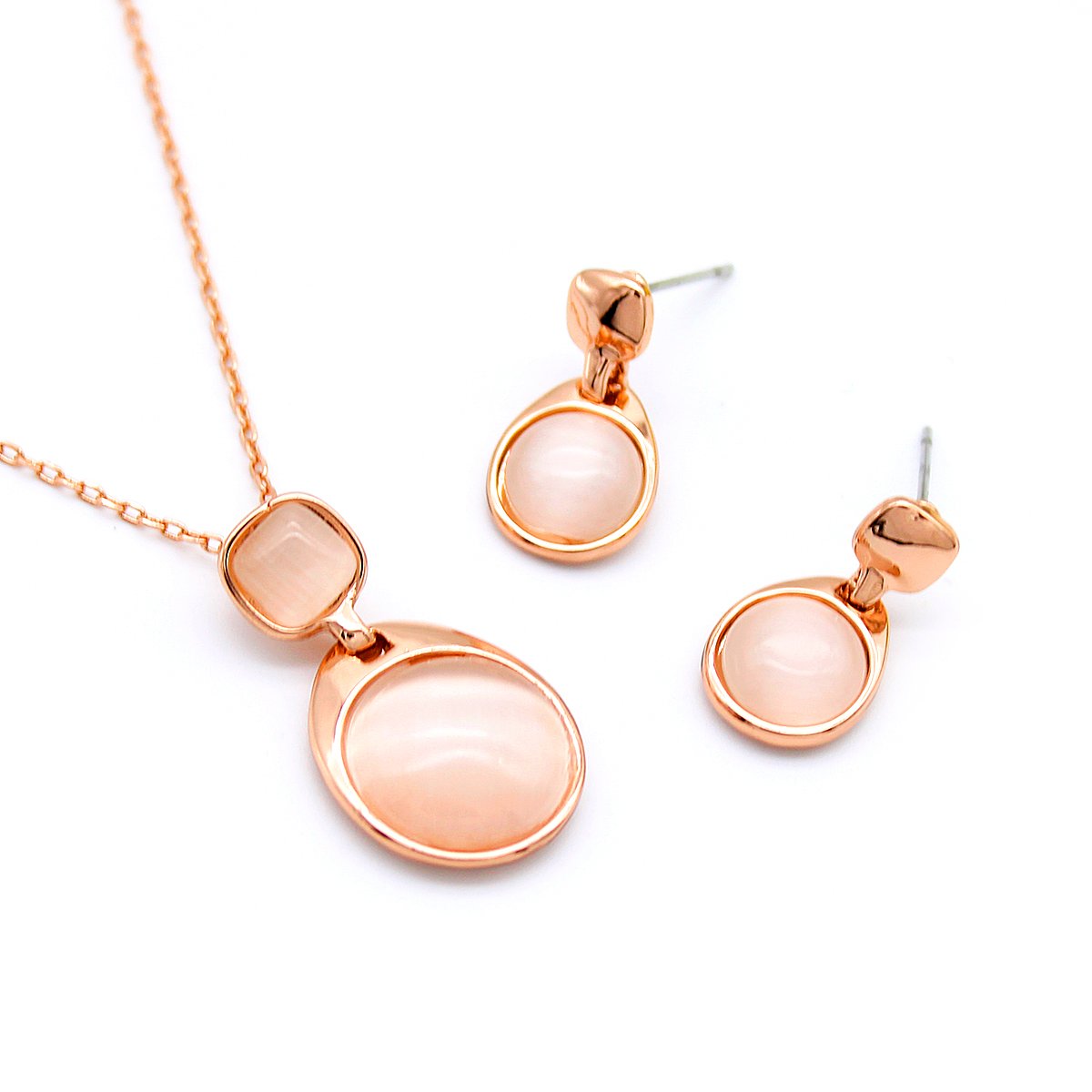 K000475A-001.72.A Wholesale Cat Eye Jewelry Set featuring unique milky stones and rose gold plating from JuneJewelry.com – original high-quality fashion accessories for bulk buyers.