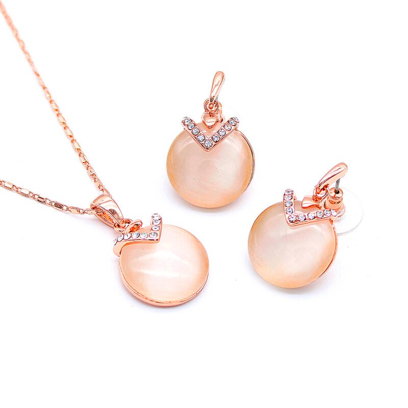 Wholesale Chevron Cat Eye Set with round milky stone and sparkling cubic zirconia chevron in rose gold plating from JuneJewelry.com – unique fashion jewelry for bulk orders.