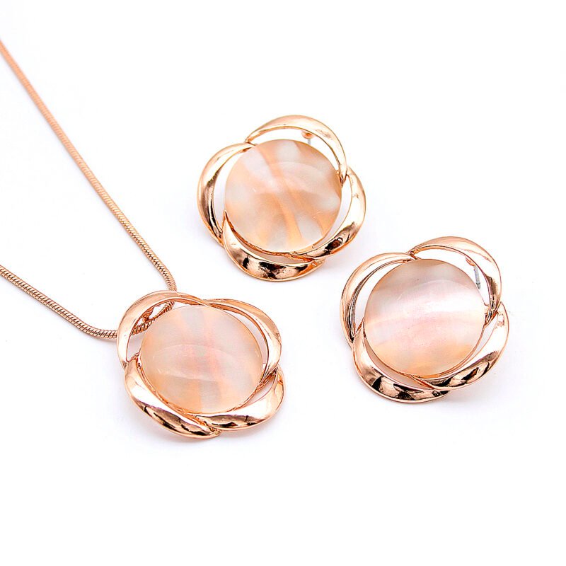 Wholesale Orbital Cat Eye Set with round milky stone and cubic zirconia band in rose gold plating from JuneJewelry.com – unique fashion jewelry for bulk orders.