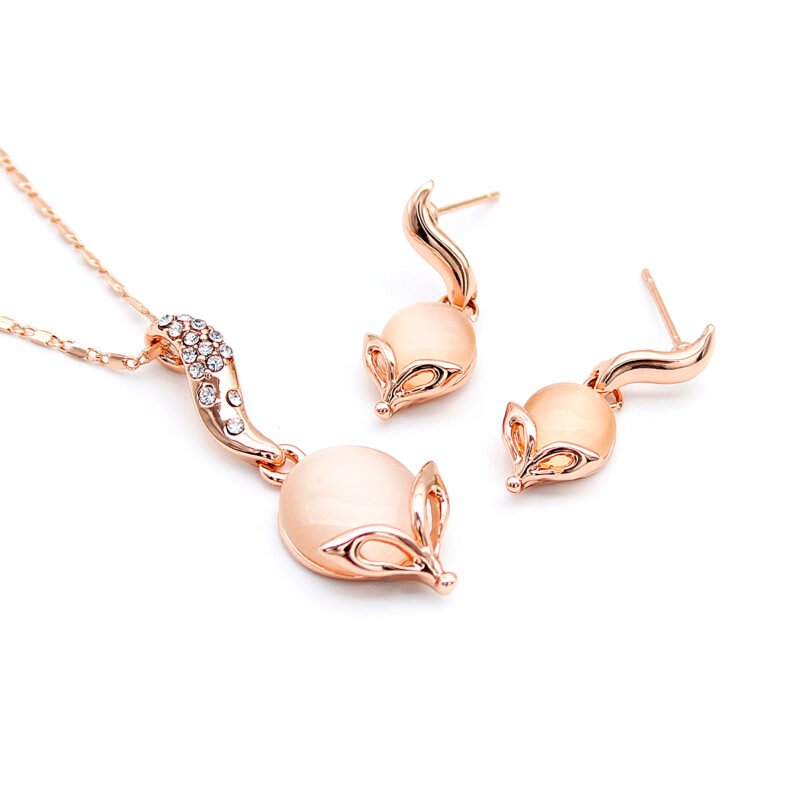 Wholesale Fox Cat Eye Set with milky stone shaped like a fox in rose gold plating from JuneJewelry.com – unique animal-themed fashion jewelry for bulk orders.
