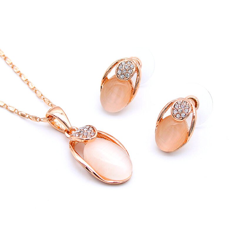 Wholesale Elegant Cat Eye Jewelry Set with CZ accents and oval cat eye stone in rose gold plated setting from JuneJewelry.com – cheap, high-quality fashion jewelry for bulk orders with free shipping.