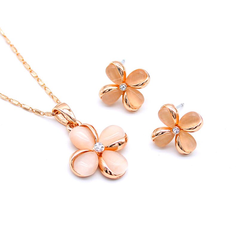 Wholesale cat eye flower jewelry set in rose gold plating with cubic zirconia from JuneJewelry.com – unique four-petal design necklace and stud earrings for bulk purchase.