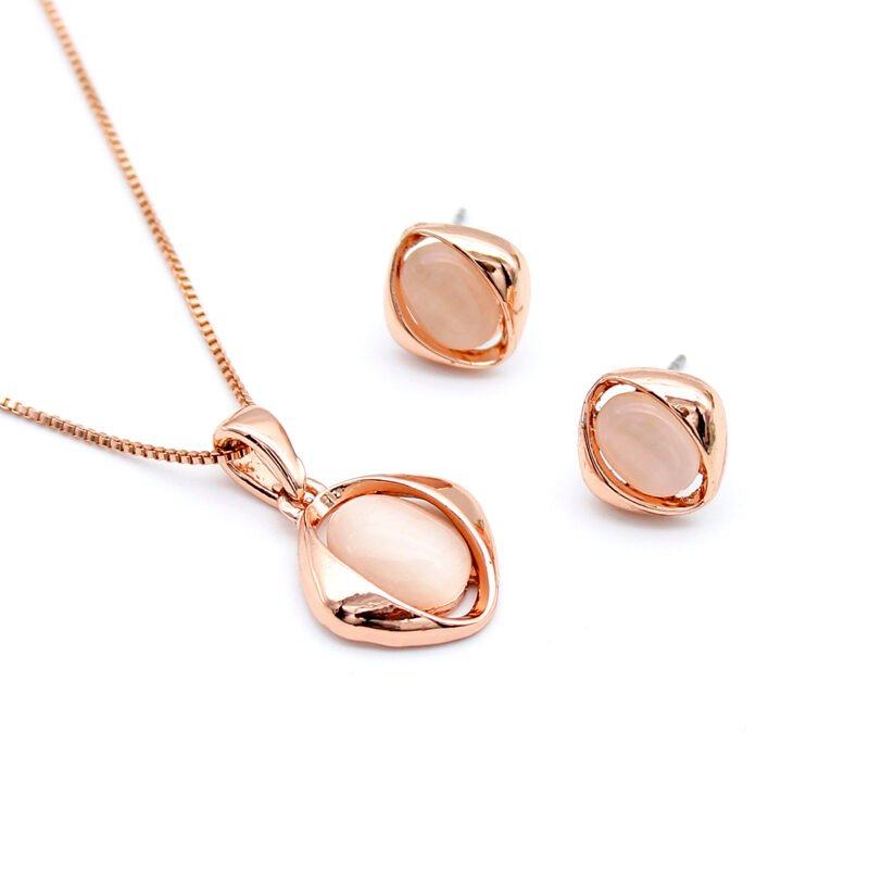Wholesale Geometric Cat Eye Set with pink cat eye stone in true rose gold plating from JuneJewelry.com – cheap, high-quality fashion jewelry for bulk orders with free shipping.