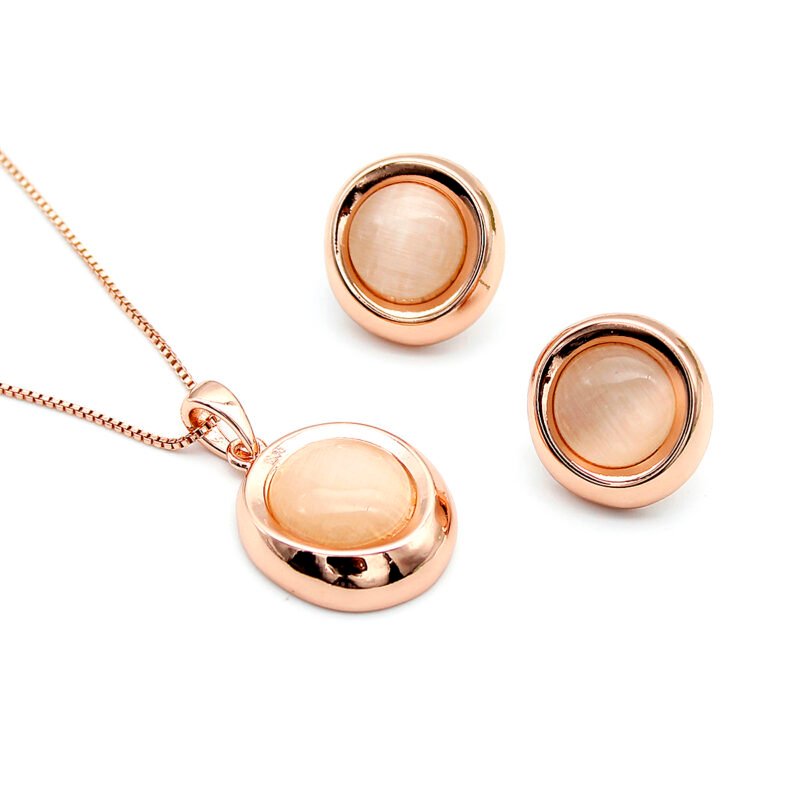 Wholesale Minimalist Cat Eye Set with round milky stone in simple rose gold bezel setting from JuneJewelry.com – elegant fashion jewelry for bulk orders.