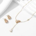 Wholesale Gourd Zircon Jewelry Set (Hulu shape), featuring copper plated with 18K gold or white gold, micro-pave high-end zircon stones, gourd stud earrings, and a simple versatile neck chain, a light luxury set from junejewelry.com.