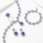 Luxury zircon jewelry set wholesale – white gold plated 4-piece necklace, earrings, bracelet, and ring with geometric zircon stones from JuneJewelry.com.