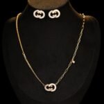 Geometric shell and cubic zirconia necklace and earrings jewelry set plated with 18K gold – luxury wholesale jewelry for women.