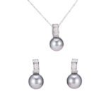 Wholesale Simple Baguette Pearl Set on a white background, featuring a necklace and drop earrings. Both pieces showcase a round dark gray pearl suspended from a rectangular bail fully paved with Baguette-Cut Cubic Zirconia.