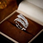 Wholesale Zircon Snake Jewelry Set, featuring high-quality zircon stones, white gold plated copper, a unique serpent design choker necklace, matching snake earrings, and a ring, a light luxury set from junejewelry.com.